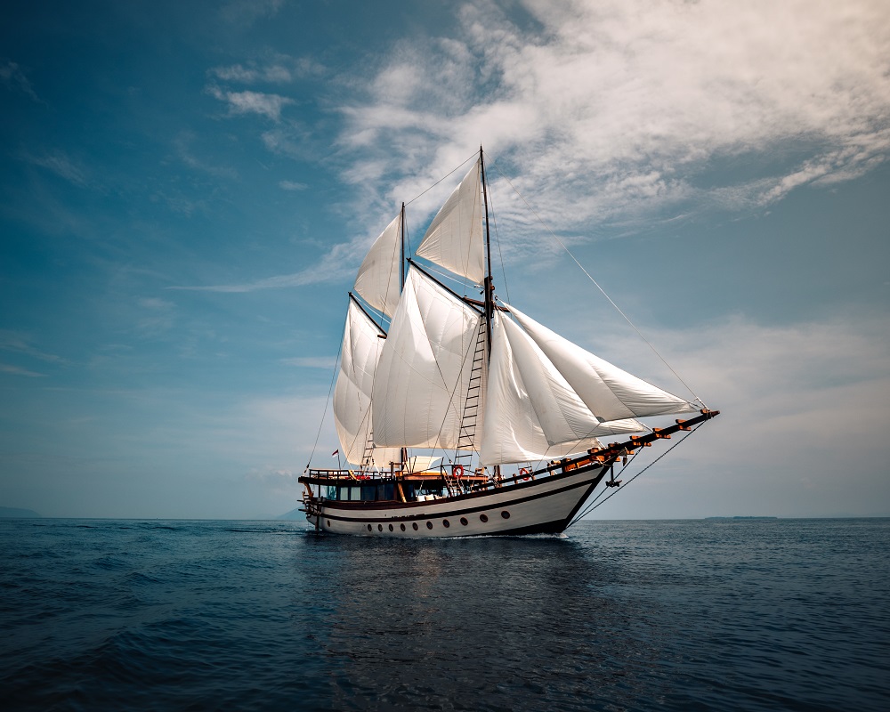 Senja Yacht anchored beside a tropical island in Indonesia