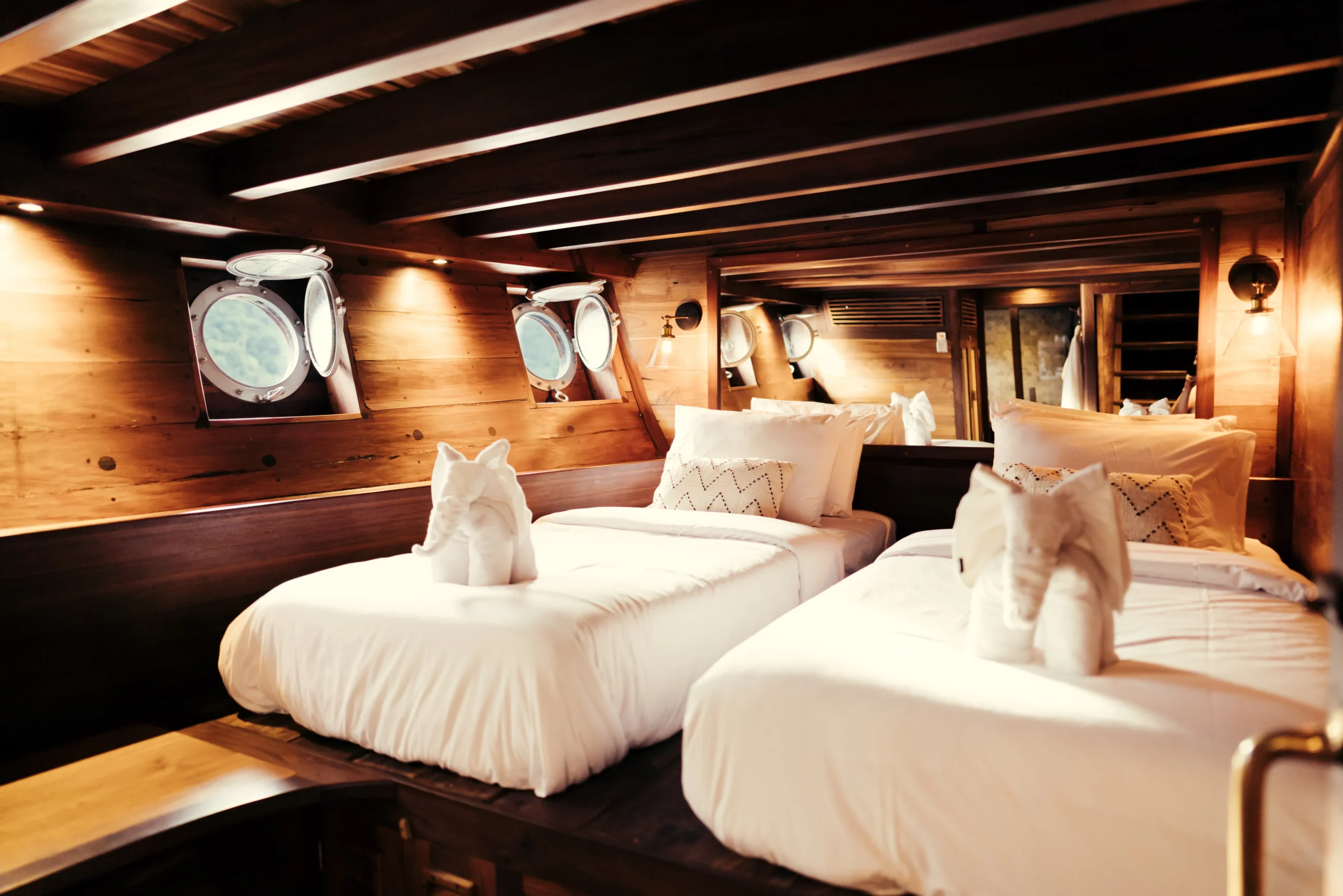 Senja Yacht lower-deck Guest Cabin with comfortable bedding
