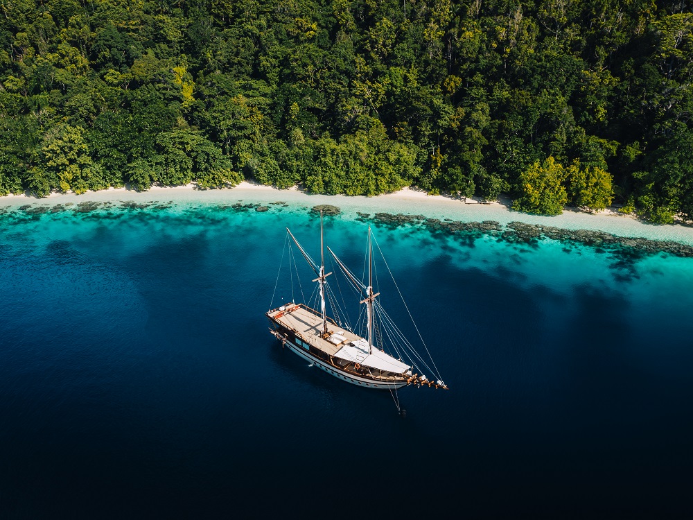 Senja Yacht upper deck surrounded by blue ocean