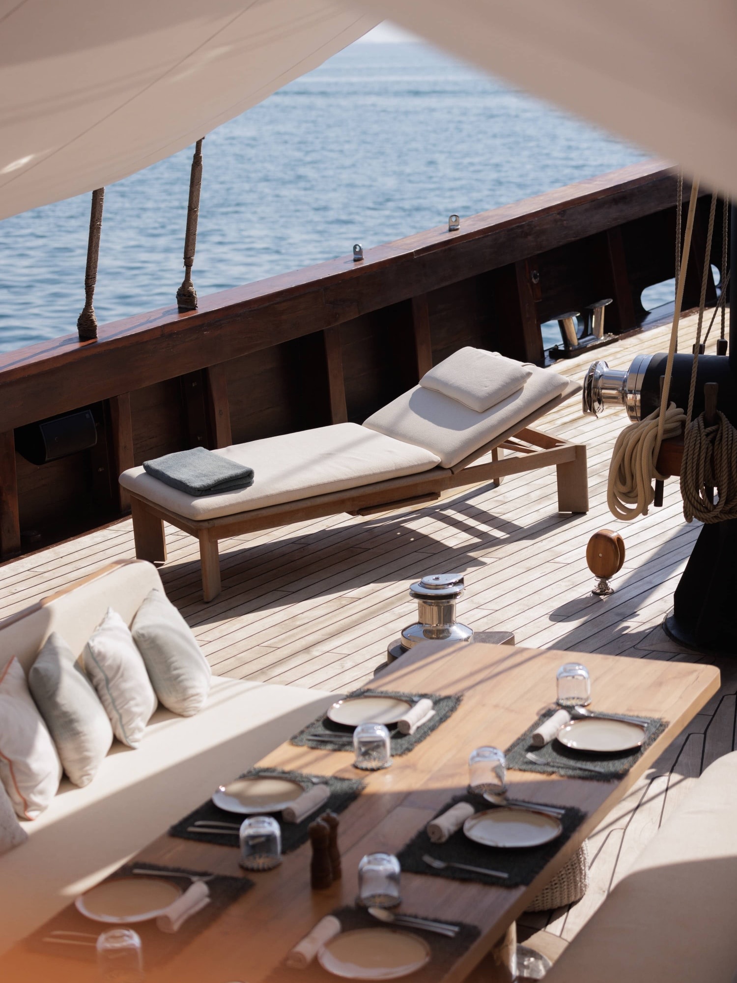 Teak deck and sailing rigging aboard Vela Yacht