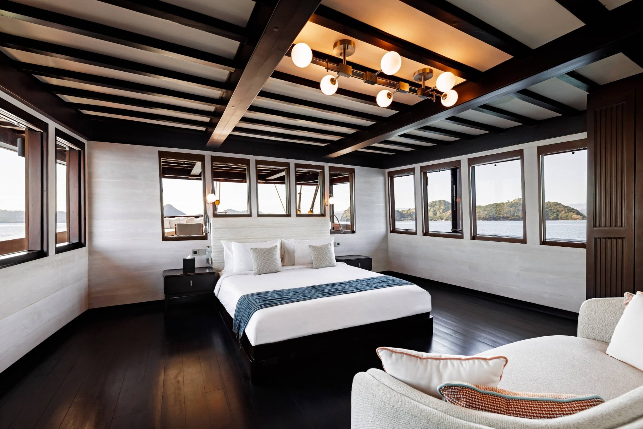Comfortable lounge with ocean views on Vela Yacht